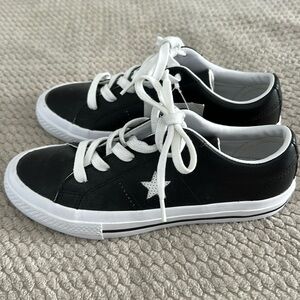 Immaculate BNWT black leather Kids Converse sneakers